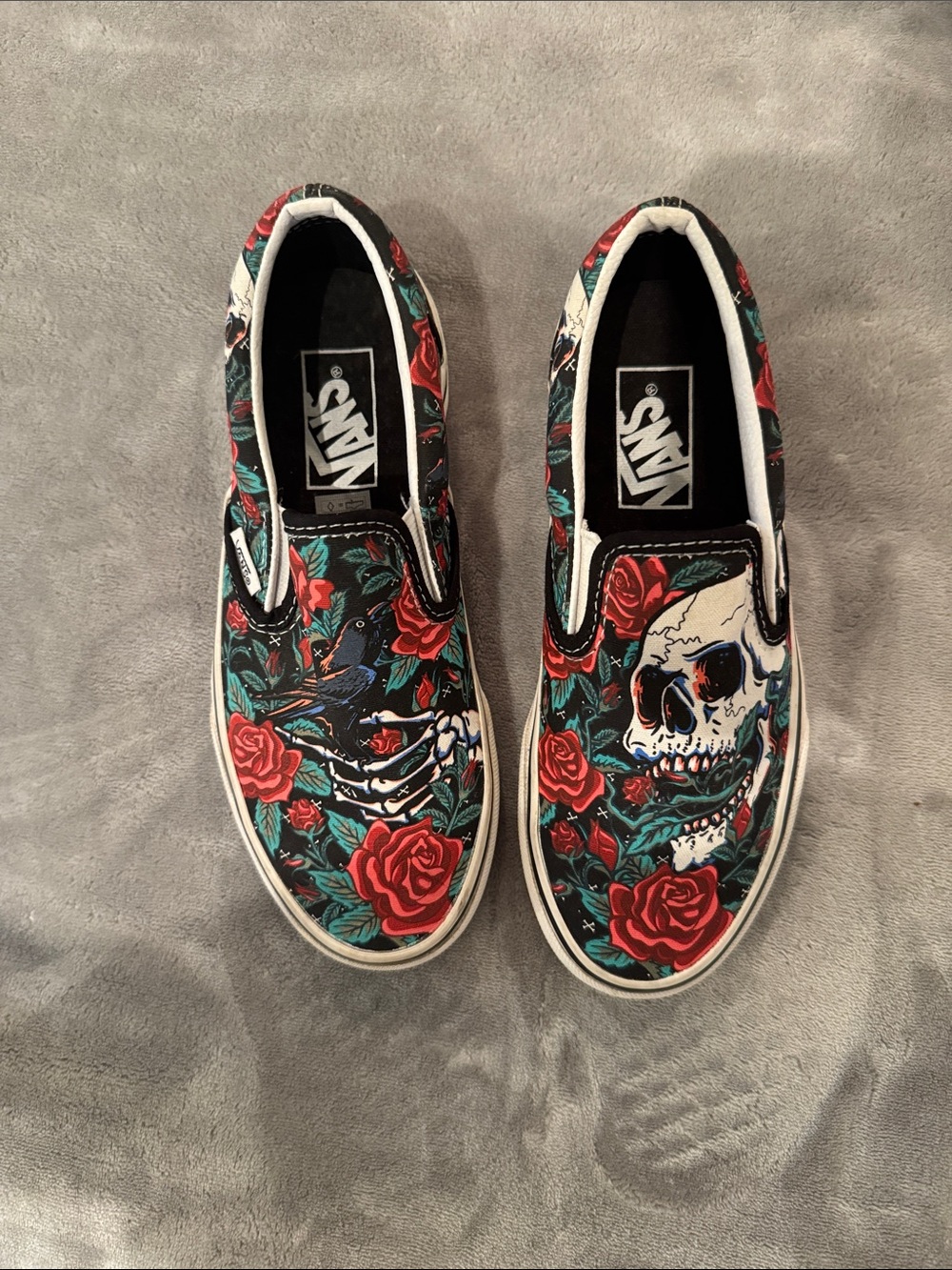 Vans Black Slip-On Sneakers with Red Rose & Teal Leaf Skull Print